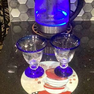 2  6 Oz Blue Tinted Glasses. Perfect for your favorite ice cream